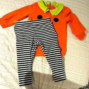 Pumpkin outfit . Only used once. A bit of some fuzz ball as seen on picture 2.